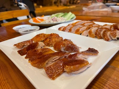 Утка по-пекински Nhi Ky Quan